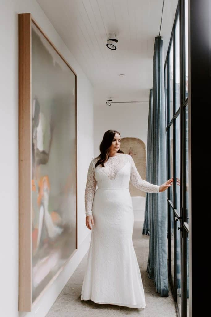 a plus size bride in a wedding gown