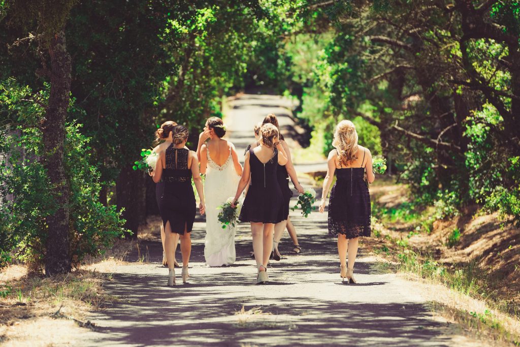 a bridal party walking away from the camera