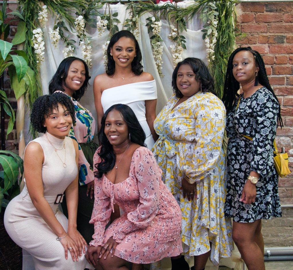 bride with her bridal party at a bridal shower
