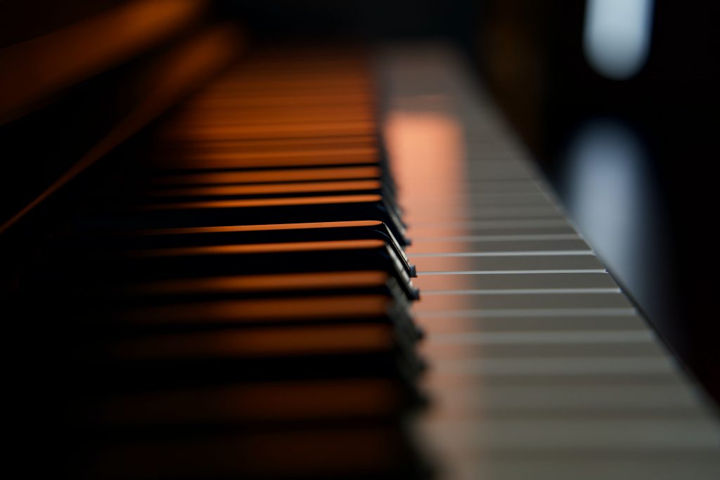 close up of piano keys from the side