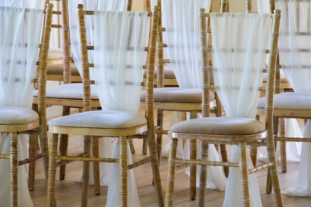 cane chairs with white fabric