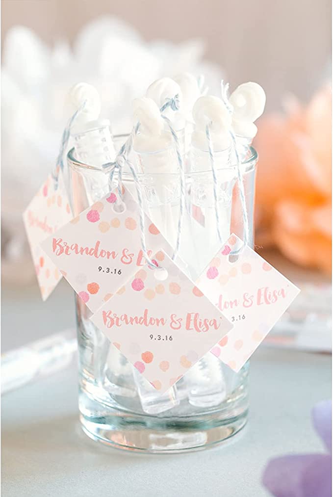 bubbles in a jar that says "brandon and elisa 9/3/16"